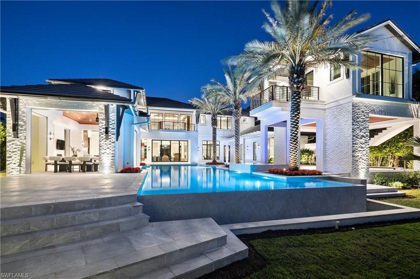 NOW COMPLETE! Commanding a rare, western lakefront view in Old - Beach Home for sale in Naples, Florida on Beachhouse.com