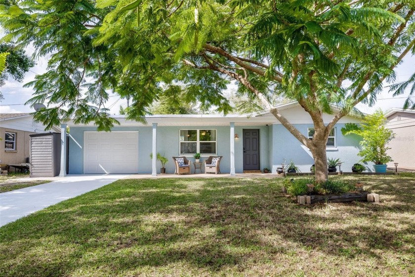 Step into this stunningly renovated home, brimming with modern - Beach Home for sale in Holiday, Florida on Beachhouse.com