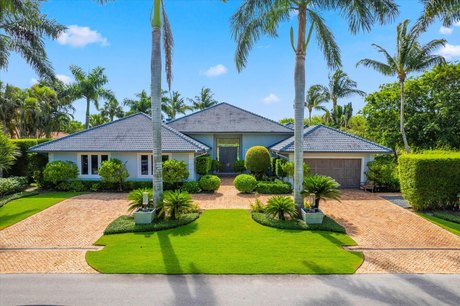 Introducing a stunning 5 -bedroom, 5-bath estate home located on - Beach Home for sale in Wellington, Florida on Beachhouse.com