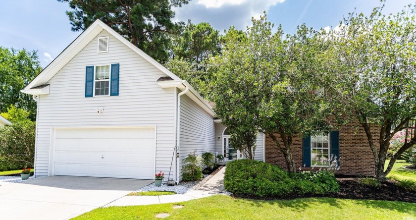 Welcome to this beautifully maintained 4-bedroom, 3- full bath - Beach Home for sale in Surfside Beach, South Carolina on Beachhouse.com