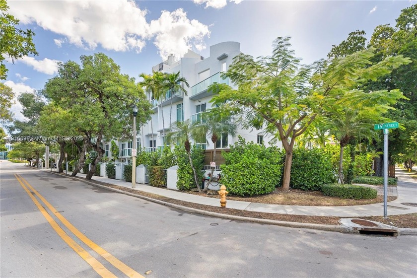 Nestled in a prime Miami Beach neighborhood, this three-bedroom - Beach Townhome/Townhouse for sale in Miami Beach, Florida on Beachhouse.com