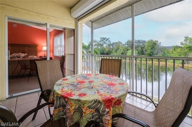 End-Unit with a lake view. Owner installed impact windows and an - Beach Home for sale in Naples, Florida on Beachhouse.com