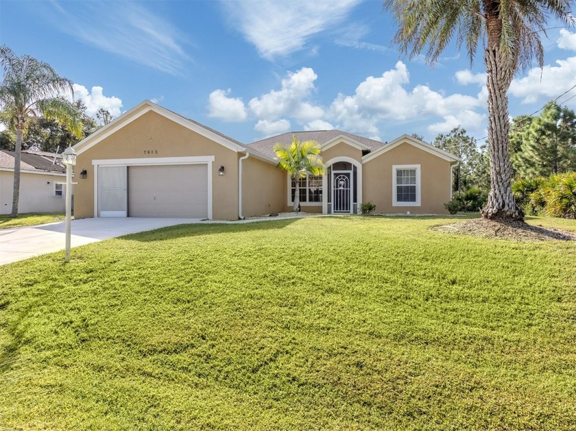 This 3 bedroom, 2 bath POOL home on a private lot in Sunny North - Beach Home for sale in North Port, Florida on Beachhouse.com