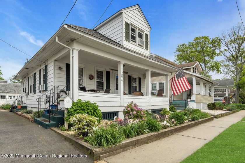 This charming, beautifully landscaped shore cottage shows like a - Beach Home for sale in Belmar, New Jersey on Beachhouse.com