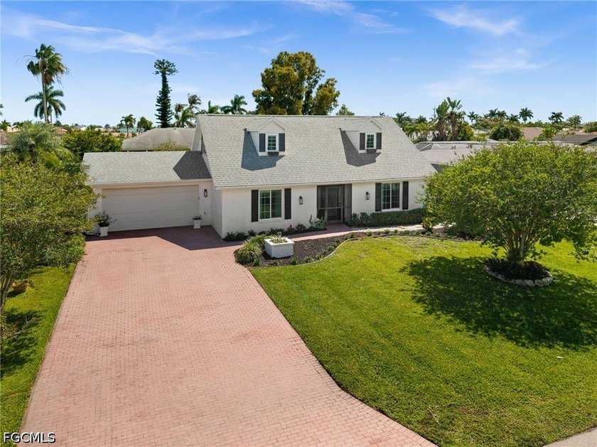 DISTINCTIVE CAPE COD STYLE HOME IN CAPE CORAL'S SOUGHT AFTER - Beach Home for sale in Cape Coral, Florida on Beachhouse.com