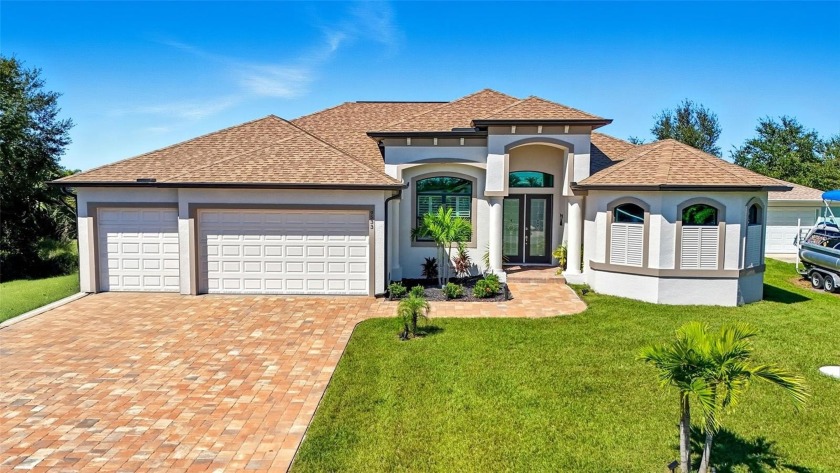 Built in 2023, this immaculate home offers soaring 14-ft - Beach Home for sale in Port Charlotte, Florida on Beachhouse.com