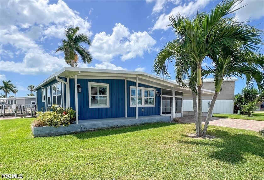 This meticulously updated 2-bedroom + den, 2-bath canal-front - Beach Home for sale in Fort Myers Beach, Florida on Beachhouse.com