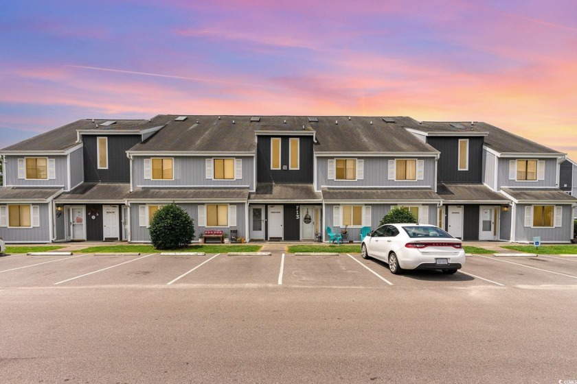 Nestled amidst the serene landscapes of Golf Colony Lane - Beach Condo for sale in Little River, South Carolina on Beachhouse.com