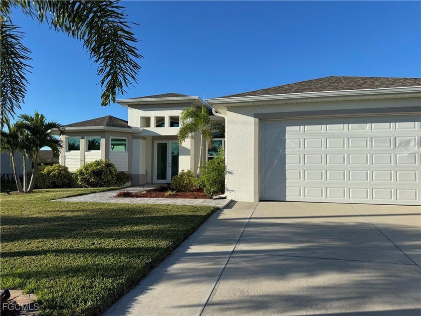 Top Location in NW Cape Coral. Stylish 3-bed, 2-bath home with - Beach Home for sale in Cape Coral, Florida on Beachhouse.com