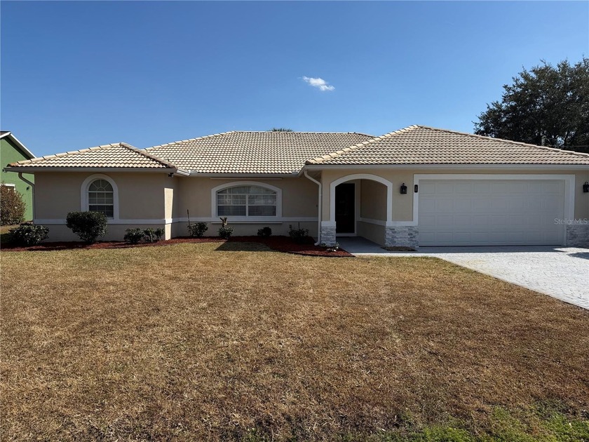 This spacious 3 bedroom, 2-bath Amaral Home with tile roof & - Beach Home for sale in Palm Coast, Florida on Beachhouse.com