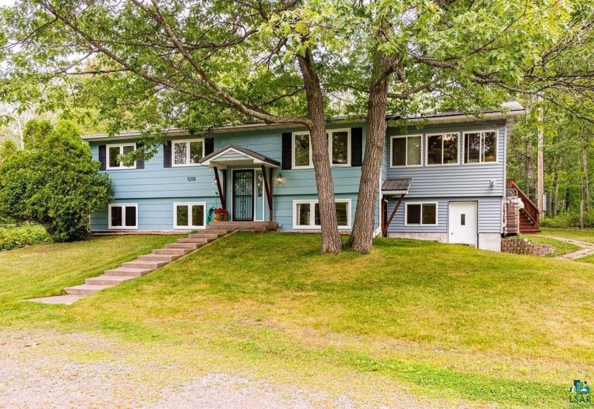 Oh the possibilities...this spacious split-entry is set back off - Beach Home for sale in Duluth, Minnesota on Beachhouse.com