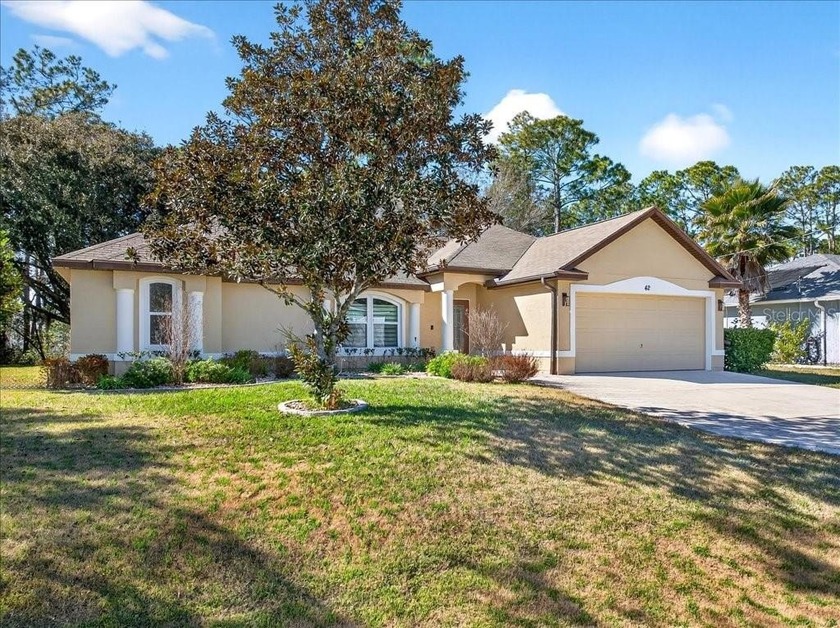 Welcome to this charming freshwater canal home, built by - Beach Home for sale in Palm Coast, Florida on Beachhouse.com