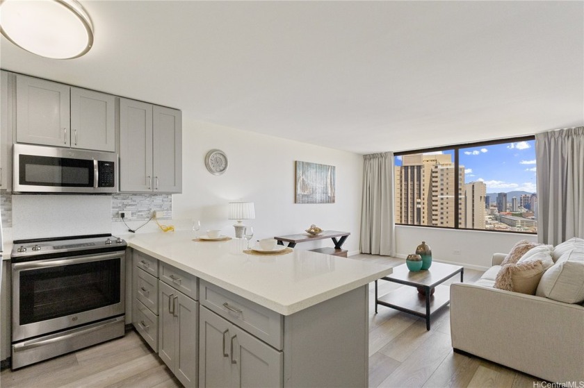 Breathtaking ocean and city views await from this higher-floor - Beach Condo for sale in Honolulu, Hawaii on Beachhouse.com