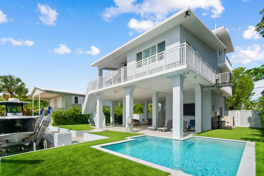 Turnkey Canal Front Pool Home with Ocean Views, Deepwater - Beach Home for sale in Key Largo, Florida on Beachhouse.com