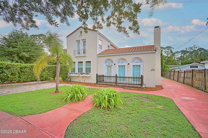 Welcome to this EXQUISITELY restored 1925 Mediterranean Revival - Beach Home for sale in Daytona Beach, Florida on Beachhouse.com