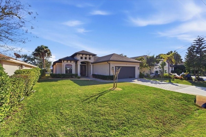 Beautiful solar canal-front home with in-ground pool! This - Beach Home for sale in Palm Coast, Florida on Beachhouse.com
