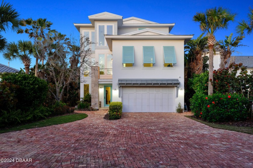 THIS GATED OCEANFRONT ESTATE HOME, WITH ITS PRIME LOCATION - Beach Home for sale in Daytona Beach Shores, Florida on Beachhouse.com