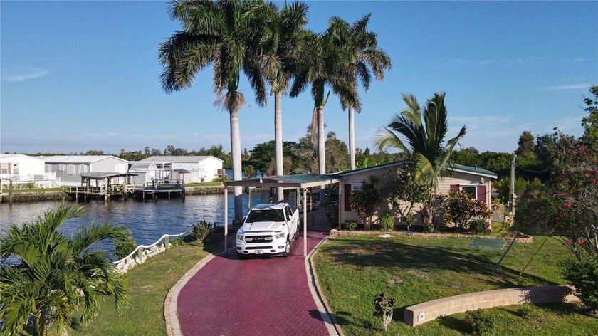 Discover your piece of paradise with approximately 240 feet of - Beach Home for sale in Punta Gorda, Florida on Beachhouse.com