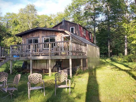 A rustic gem situated high on a ridge at the end of the - Beach Home for sale in Herbster, Wisconsin on Beachhouse.com