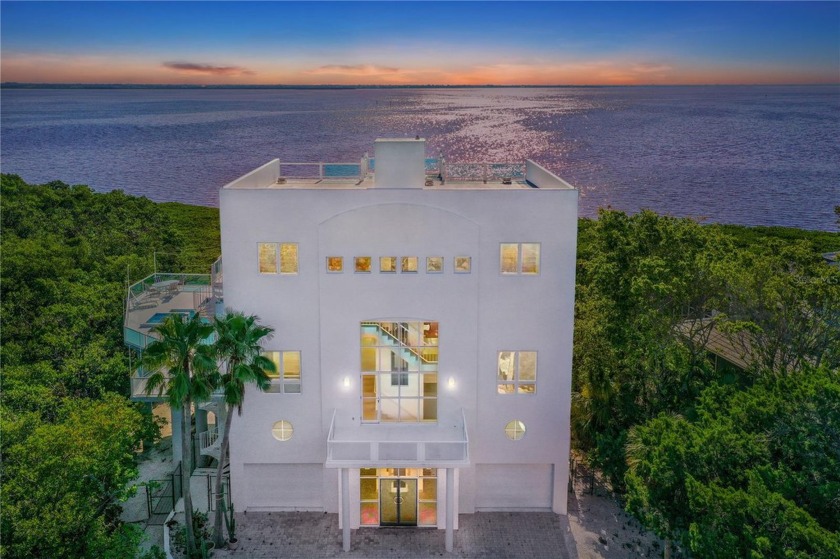 Behold a sanctuary of contemporary elegance, where luxury and - Beach Home for sale in Longboat Key, Florida on Beachhouse.com