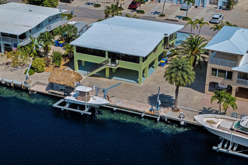 Discover island living at its finest at 153 El Capitan Drive - Beach Home for sale in Lower Matecumbe Key, Florida on Beachhouse.com