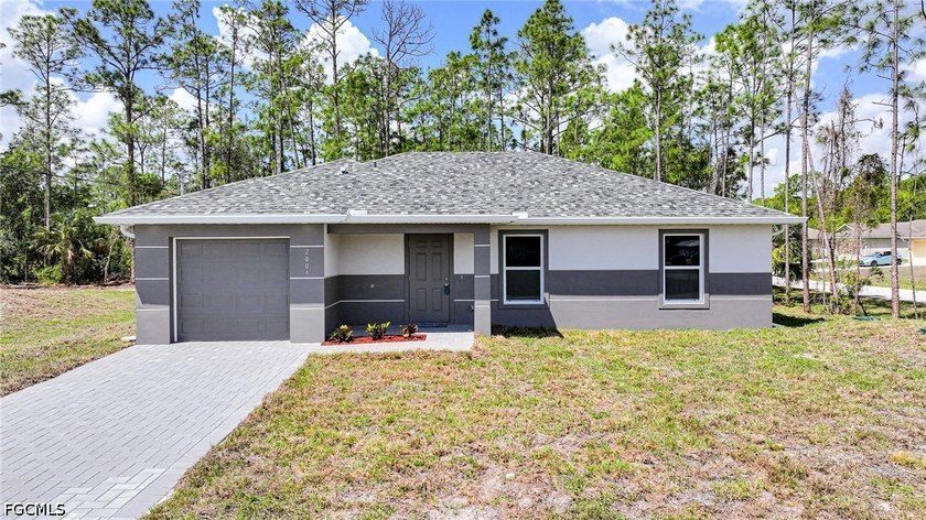 OVERSIZED LOT WITH SOME OLD GROWTH TREES! BRAND NEW - Beach Home for sale in Lehigh Acres, Florida on Beachhouse.com