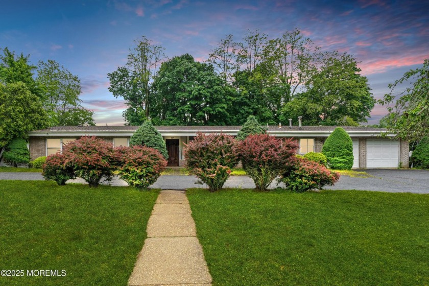 WONDERFUL WEST DEAL when you FOREVER own this RENOVATED and WIDE - Beach Home for sale in Oakhurst, New Jersey on Beachhouse.com