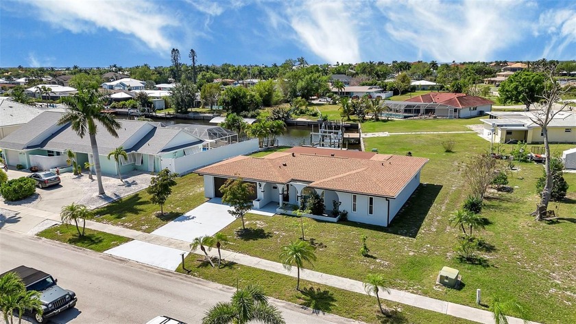 This Charming, waterfront home offers direct, unobstructed - Beach Home for sale in Port Charlotte, Florida on Beachhouse.com