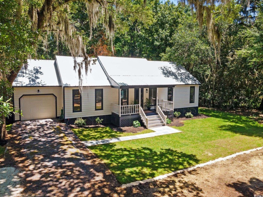 Nestled amidst the tranquil coastal beauty of Pawleys Island, SC - Beach Home for sale in Pawleys Island, South Carolina on Beachhouse.com