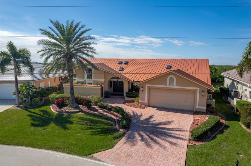 CUSTOM, COURTYARD POOL HOME W/OVER 4,300 SQ FT, **NEW ROOF** - Beach Home for sale in Punta Gorda, Florida on Beachhouse.com