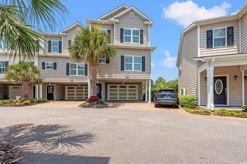 Luxury coastal living awaits at 1907 Enclave Ln--an impeccably - Beach Townhome/Townhouse for sale in North Myrtle Beach, South Carolina on Beachhouse.com