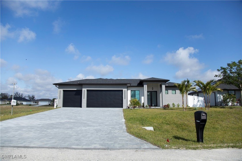Stunning new construction pool home located in a quiet - Beach Home for sale in Cape Coral, Florida on Beachhouse.com