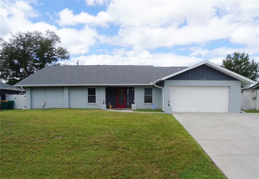 Welcome to this 1785 sq. ft. pool home with a 2 car garage - Beach Home for sale in Port Charlotte, Florida on Beachhouse.com