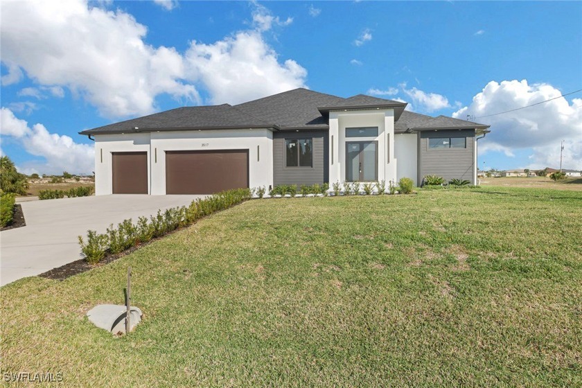 Discover the epitome of modern luxury at 3517 NW 46th Ave, Cape - Beach Home for sale in Cape Coral, Florida on Beachhouse.com