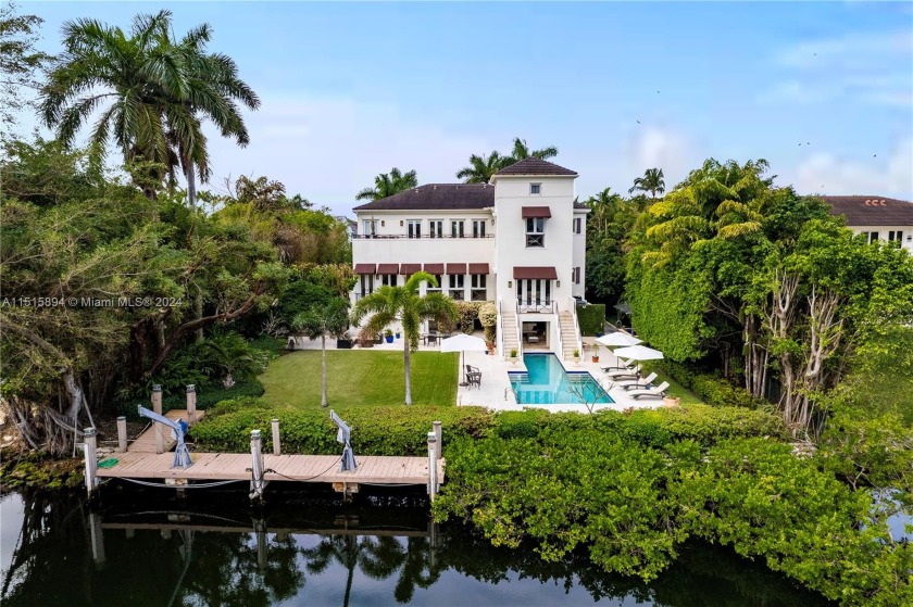 Situated on the tranquil waterfront of Cocoplum's premier canal - Beach Home for sale in Coral Gables, Florida on Beachhouse.com