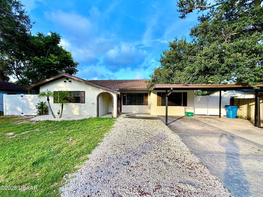 NEW PRICE NOW WELL-BELOW MARKET VALUE! Spanish-Style Pool Home - Beach Home for sale in Daytona Beach, Florida on Beachhouse.com