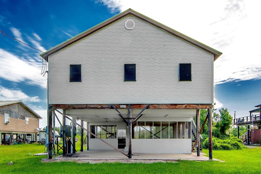 Less than two miles from Falgoust Marina, this bayou home offers - Beach Home for sale in Theriot, Louisiana on Beachhouse.com