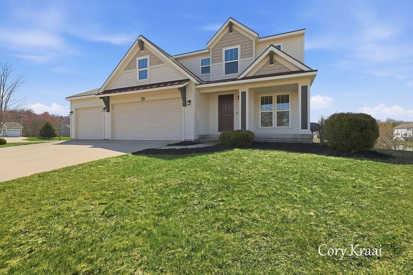 This beautiful, 3 bedroom, 2.5 bath home offers the perfect - Beach Home for sale in Norton Shores, Michigan on Beachhouse.com