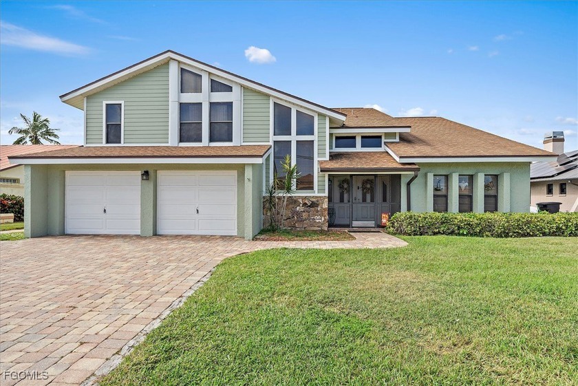 Wonderful SFR Lakefront Living on Lake Alhambra - Western - Beach Home for sale in Cape Coral, Florida on Beachhouse.com