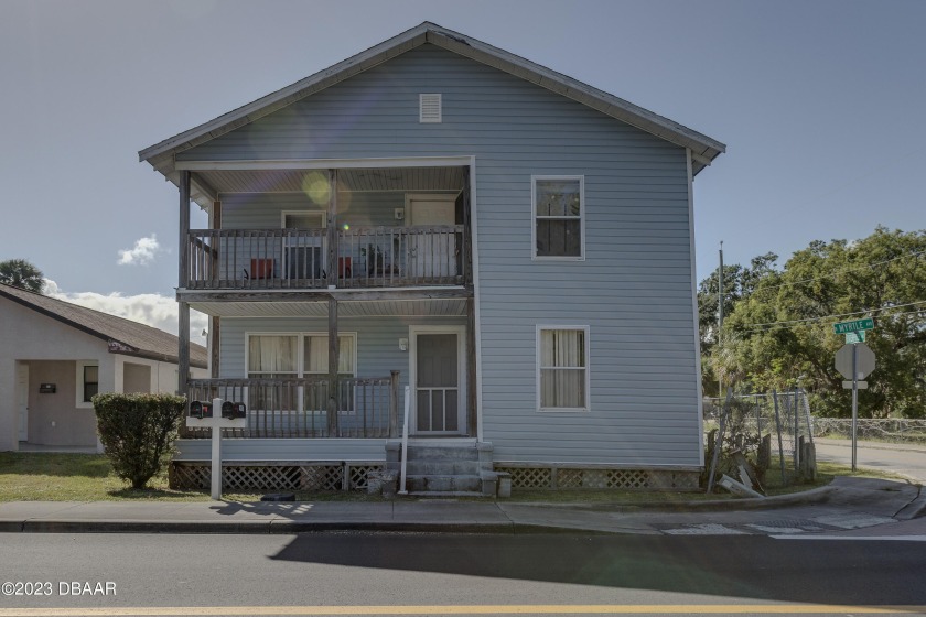 Step into a charming duplex two minutes to shops and restaurants - Beach Home for sale in New Smyrna Beach, Florida on Beachhouse.com