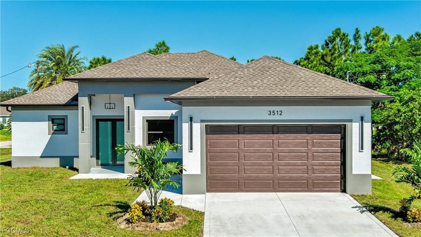 Discover this beautifully designed 4-bedroom, 4-bathroom corner - Beach Home for sale in Lehigh Acres, Florida on Beachhouse.com