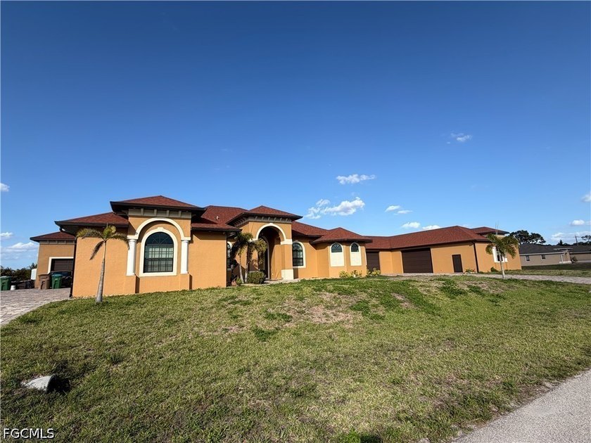 Step into pure Florida luxury in this stunning 3,460-sq-ft - Beach Home for sale in Cape Coral, Florida on Beachhouse.com
