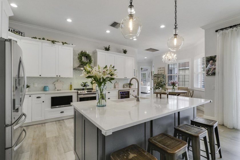 Bright, inviting, and ideally situated, this courtyard-style - Beach Home for sale in Jupiter, Florida on Beachhouse.com