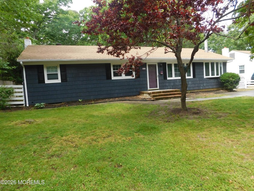 Welcome home to 1563 Forge Pond Road, nestled in the highly - Beach Home for sale in Brick, New Jersey on Beachhouse.com