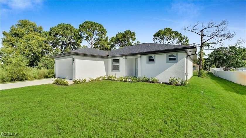 New construction featuring 3 bedrooms, a den, 2 bathrooms, and a - Beach Home for sale in Lehigh Acres, Florida on Beachhouse.com