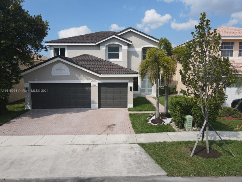 Step into the epitome of luxury! Nestled within a gated lakeside - Beach Home for sale in Miramar, Florida on Beachhouse.com