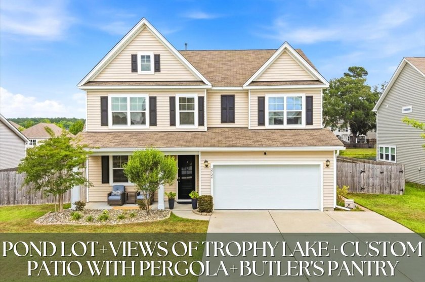 Situated on a premium pond lot, this stunning home is located - Beach Home for sale in Johns Island, South Carolina on Beachhouse.com