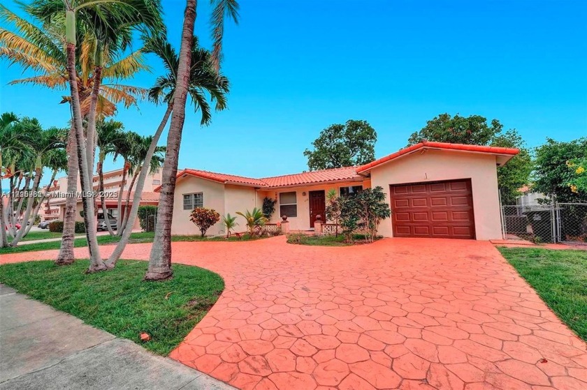 Discover this charming 4-bedroom, 2-bathroom home perfectly - Beach Home for sale in Hallandale Beach, Florida on Beachhouse.com