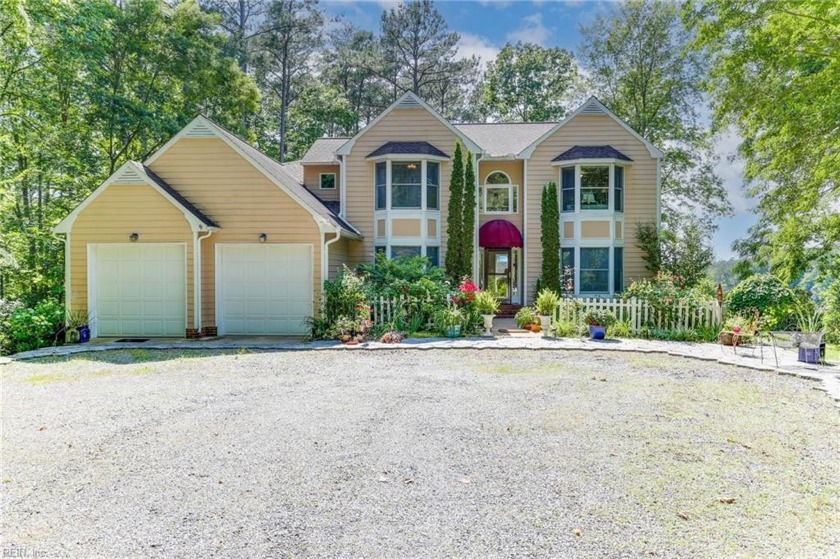 Enjoy the private wooded drive to your waterfront home.  A - Beach Home for sale in Kilmarnock, Virginia on Beachhouse.com