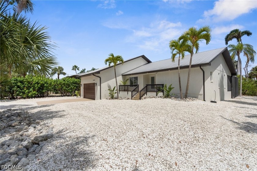 COASTAL LUXURY + INCOME PRODUCING  - FULLY FURNISHED Turnkey and - Beach Home for sale in Fort Myers, Florida on Beachhouse.com